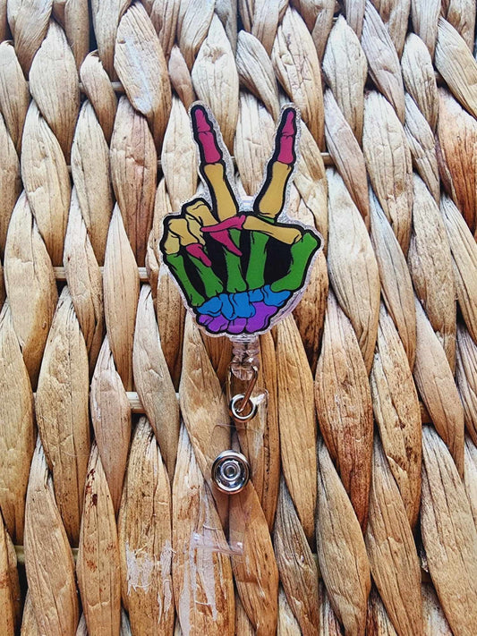 Rainbow Skeleton Hand Peace Sign Badge Reel