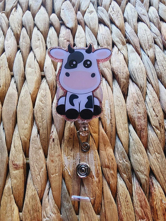 Sitting Baby Cow Badge Reel