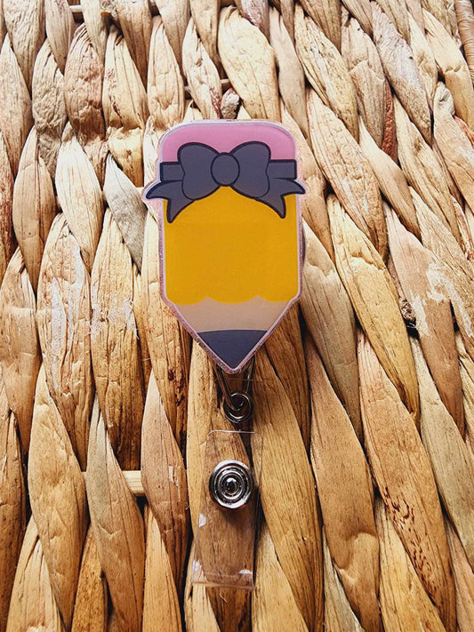 Pencil With Bow Badge Reel